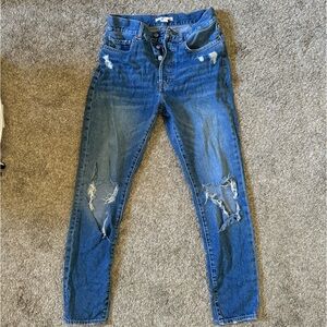 High waisted distressed jeans